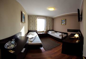 Фото номера Двухместный номер с 2 отдельными кроватями Отель Hotel Apogeum г. Пекары-Слёнске 11